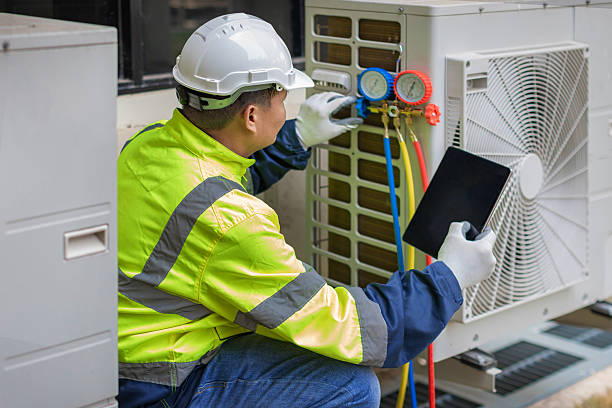 Professional Hvac technician working in Oxford, NC